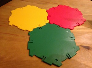 Hexagons can't form the faces of a Platonic solid because they tessellate the plane